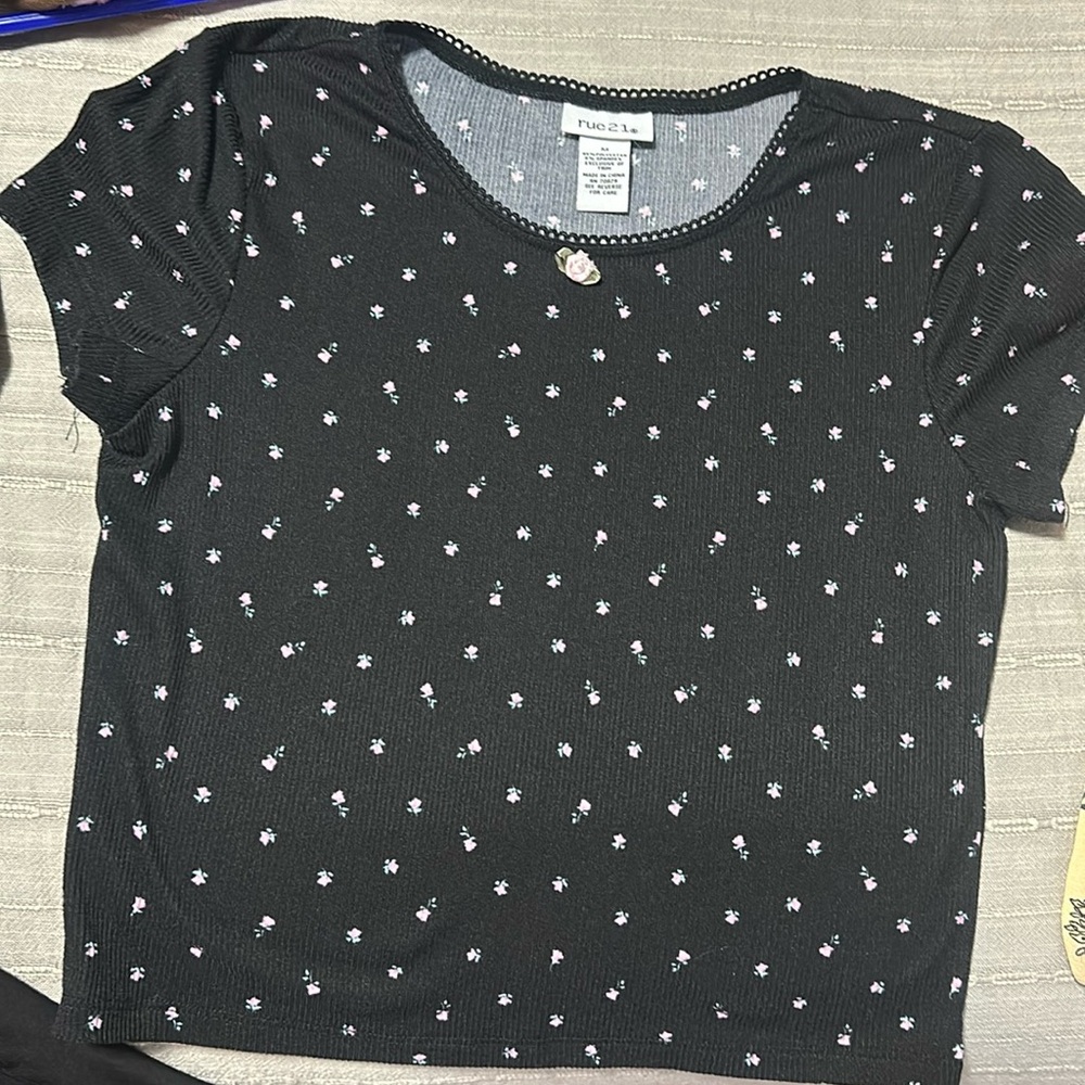 black shirt with little pink roses